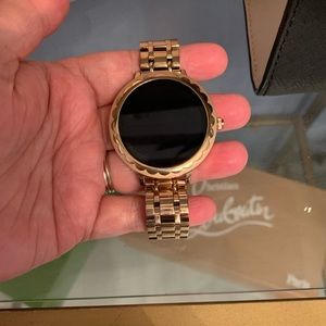 - Rose gold Kate spade smart watch